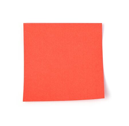 Red post it paper note on a white backgroundの写真素材