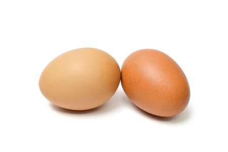 Two brown chicken egg isolated on a white backgroundの写真素材