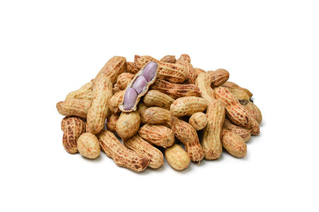 Raw peanuts isolated on a white background