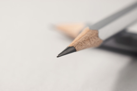 Macro shot of sharpened pencils on office tableの写真素材