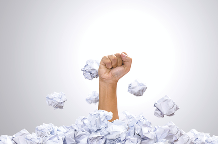 Hand punch heap of paper ball. Comfort Zone Concept, motivation and challenge concepts.の写真素材