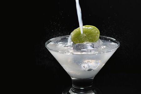 cocktail with ice and limeの写真素材