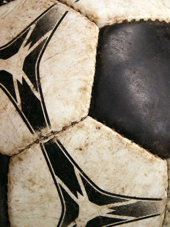 Old dirty soccer ball detail close-up. Macroの写真素材