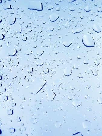 Raindrops on glass window. Detailの写真素材