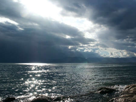 Dark clouds before sea storm in south Croatiaの写真素材