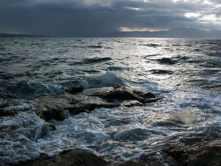 Dark clouds before sea storm in south Croatiaの写真素材