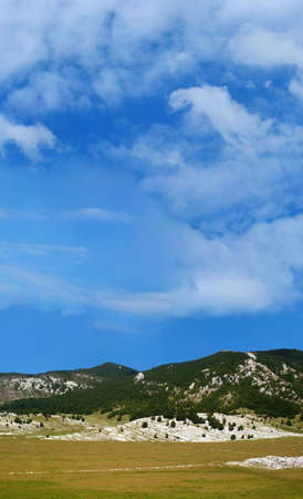 Dinara mountain over blue sky. South Croatiaの写真素材