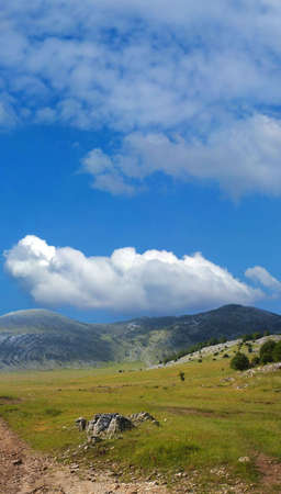 Dinara mountain over blue sky. South Croatiaの写真素材