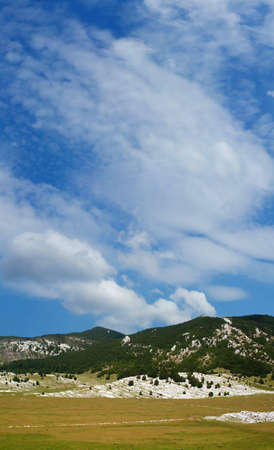 Dinara mountain over blue sky. South Croatiaの写真素材