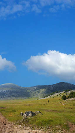 Dinara mountain over blue sky. South Croatiaの写真素材