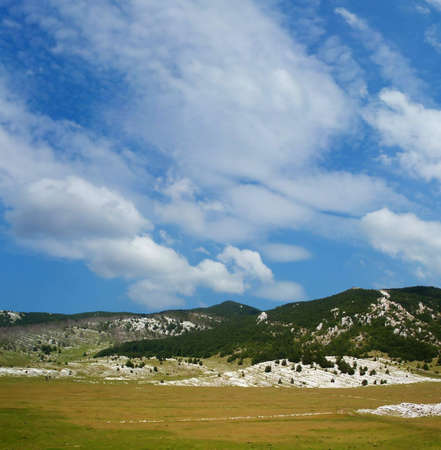 Dinara mountain over blue sky. South Croatiaの写真素材