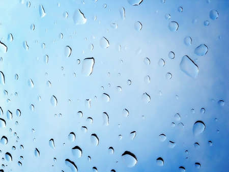 Raindrops on glass window. Detailの写真素材