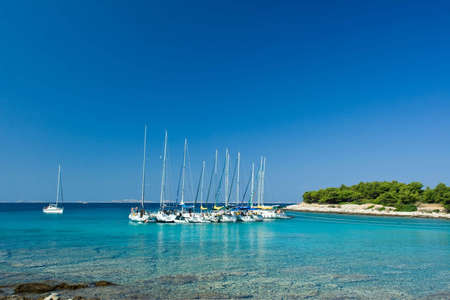 Sail boats docked in beautiful bay, Adriatic sea, Croatiaの写真素材