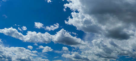 White summer clouds on blue sky sceneの写真素材