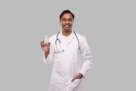Indian Man Doctor Holding Hands Sanitizer. Hands Wash Antiseptic. Corona Virus Concept. Isolatedの写真素材