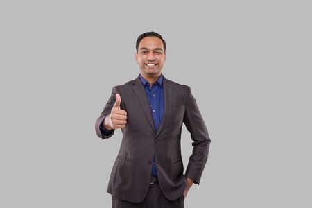 Businessman Showing Thump Up Isolated. Indian Business Man Standing Thump Up signの写真素材