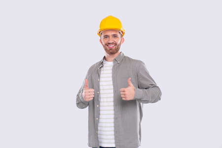 Construction Worker Showing Thumb Up Both Hands Smilling Isolated Standingの写真素材