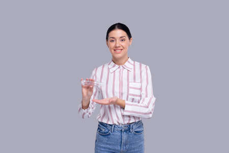 Girl Using Hand Sanitizer. Girl using Hands Antiseptic Isolatedの写真素材