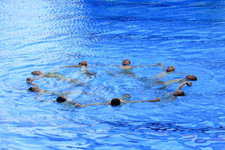 Yogyakarta, Indonesia, July28, 2016. Training and discipline are the key to  success of beautiful swimmers. A few months before competition they will train five times a week regardless of hot or rainyのeditorial素材