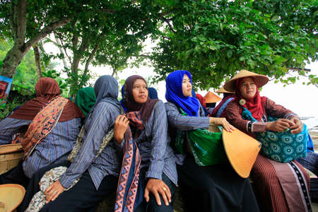 Yogyakarta, Indonesia, 04/14/2016. Residents of Wediombo Coast who work as fishermen gather to hold Ngalangi tradition as a form of their gratitude for the sea productsのeditorial素材