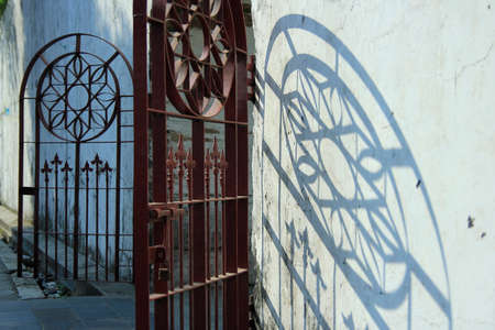 Seen from the side, the fortress is a thick and sturdy wall with a trellis door as its gateの写真素材