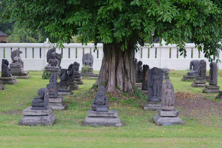 Yogyakarta, Indonesia, March 11, 2020. Temple stones in the form of historical statues that still hold mysteries to be extracted information are placed in the Prambanan Temple Museum yardのeditorial素材