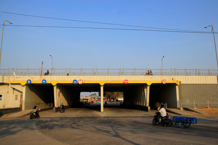Surabaya, Indonesia, Oct 29, 2015. Residents passed comfortably on the underpass road project around Suramadu Bridgeのeditorial素材