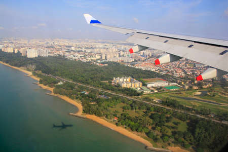 Singapore, Feb 23, 2015. Singapore's clean, green coastline is seen from aircraft approaching landing at Changi international airportのeditorial素材