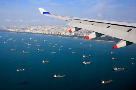 Views of dense rows of boats on the waters of Singapore photographed from the plane CI0752 China Airlines flight to Surabaya-Singapore route,  February 23, 2015.のeditorial素材
