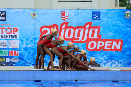 Yogyakarta, Indonesia, July 28, 2016. A group of beautiful swimming athletes make a beautiful formation before entering the pool in a competitionのeditorial素材
