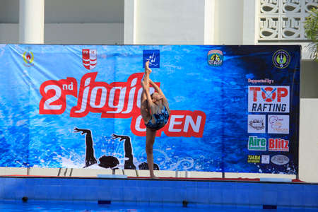 Yogyakarta, Indonesia, July 28, 2016. A beautiful swimming athletes make a beautiful pose before entering the pool in a competition.のeditorial素材