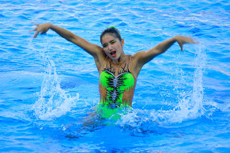 Yogyakarta, Indonesia, 07/28/2016. Beautiful swimmers from East Kalimantan fell in Solo Open TR category of the Beautiful Swimming Championship 2nd Jogjakarta Open Synchronized Swimming Competitionのeditorial素材