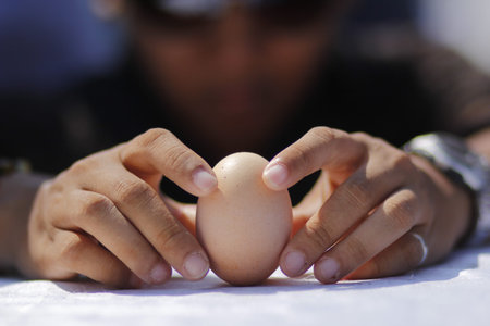 The tradition of erecting raw eggs in Chinese culture.