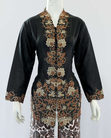Women's shirt with half sleeves and beautiful brocade embellishments from the neck to the front. Oriental and Javanese ethnic style clothes, looks elegant when used in formal events.の写真素材