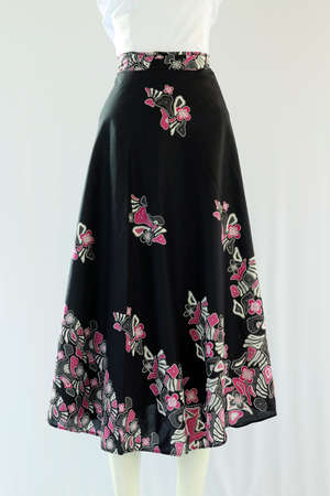Casual women's skirt with a length to the calf with a batik floral motif looks beautiful.の写真素材