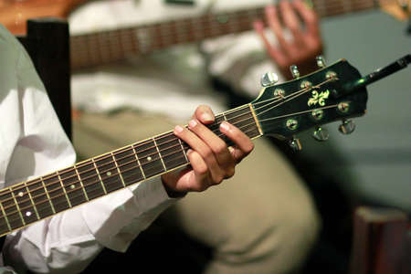 Guitarists play guitar stringed instrumentsの写真素材