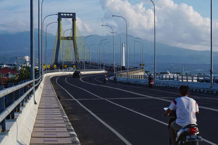 Manado, Indonesia, July 29, 2017. Soekarno Bridge, the bridge that passes over the port of Manado becomes a new icon one of the tourist destinations on the island of North Sulawesi.のeditorial素材