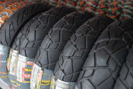 Klaten, Indonesia, June 7, 2020. Motorcycle tires with a variety of motives in an automotive workshopのeditorial素材