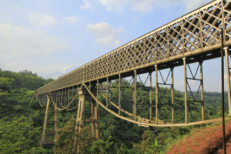 Construction of an old bridge made of steel.の写真素材