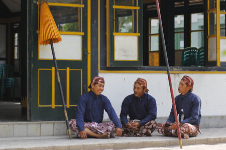 Yogyakarta, Indonesia, Oct 5, 2014. The warmth of the Abdi Dalem Sultan Palace Yogyakarta on duty guarding one corner of the palace complexのeditorial素材