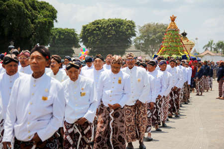 Yogyakarta, Indonesia, Oct 5, 2014. Abdi dalem Yogyakarta Palace paraded Gunungan Lanang in  Grebeg Besar tradition event. Gunungan was brought from inside  palace to courtyard of Kauman Gedhe Mosque.のeditorial素材