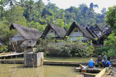 Tasikmalaya, Indonesia, July 24, 2015. The traditional village settlement landscape of Kampung Naga in West Java rejects all forms of technology from outside cultures.のeditorial素材