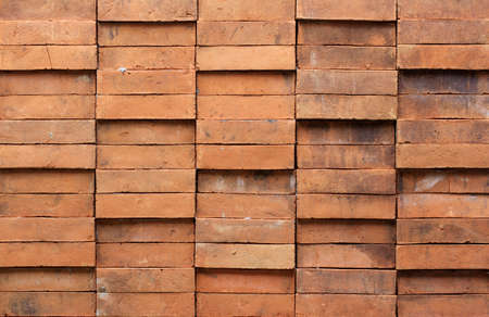 Red brown brick wall, tightly mounted as a fortress.の写真素材
