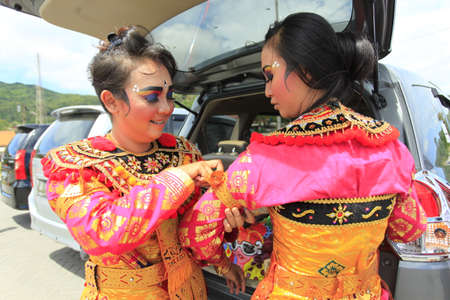 Yogyakarta, Indonesia, March 11, 2018. Balinese dancers are decorated in preparation for the performance in the Melasti worship series.のeditorial素材