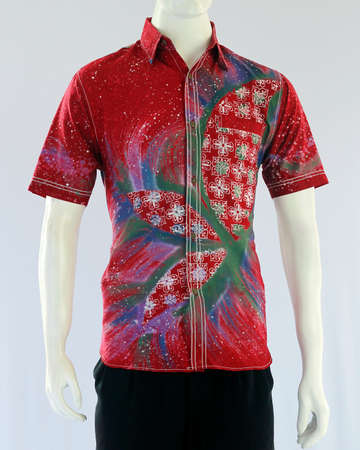 Short sleeve shirts for men with an abstract tie dye motif, a combination of batik motifs, giving a relaxed impression but still looking neat for formal events.の写真素材