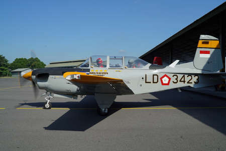 Yogyakarta, Indonesia, July 24, 2016. The training plane runs from the hangar to the runway to prepare to fly.のeditorial素材