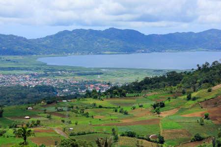 North Sulawesi, Indonesia, June 17, 2015. View of Lake Tondano is seen from the foot of Mount Mahawu, Tomohon. Is one of many tourist sites that offer a sensation of coolness and calm atmosphere.のeditorial素材