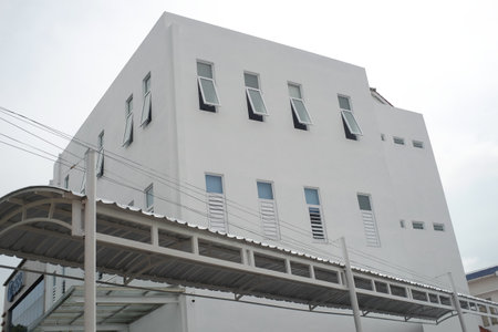 Klaten, Indonesia, Nov 11, 2021. A sturdy office building with thick walls and a number of windows.のeditorial素材