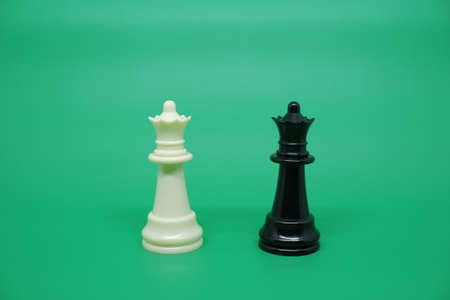 The Minister or Ratu chess piece isolated on green. In the game of chess, the Queen is the King's last line of defense and has the most lethal attack ability for the opponent.の写真素材