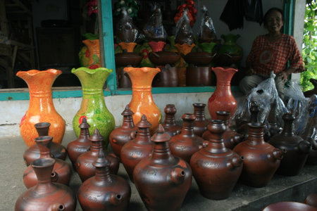 Klaten, Indonesia, May 15, 2010. Pottery products such as classic teapots and flower vases are sold in the tourist area of Bayat village.のeditorial素材